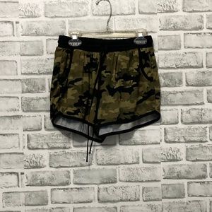 Stretchy army green shorts with string at front to make tighter.